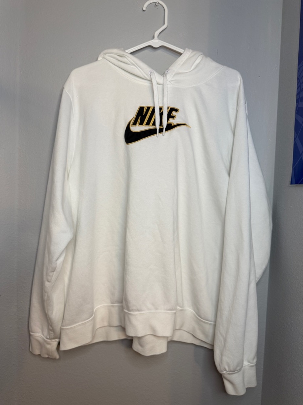 Nike White Hoodie with Black & Gold Logo